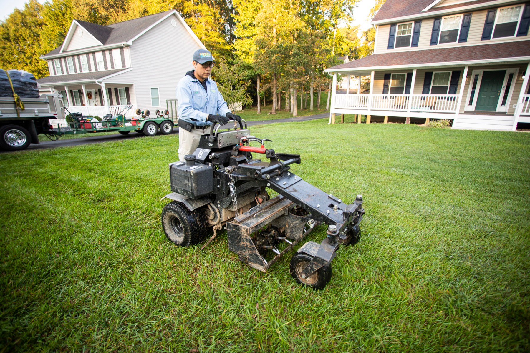 lawn tech aerating lawn in Maryland
